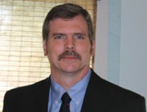 Kyle E Benton